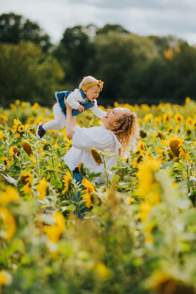family shoot in sunflower field