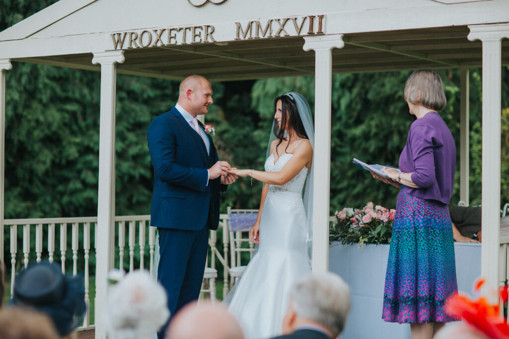 Bride and Groom exchanging vows at Wroxeter Hotel