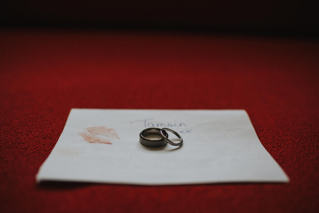 wedding rings on a love letter
