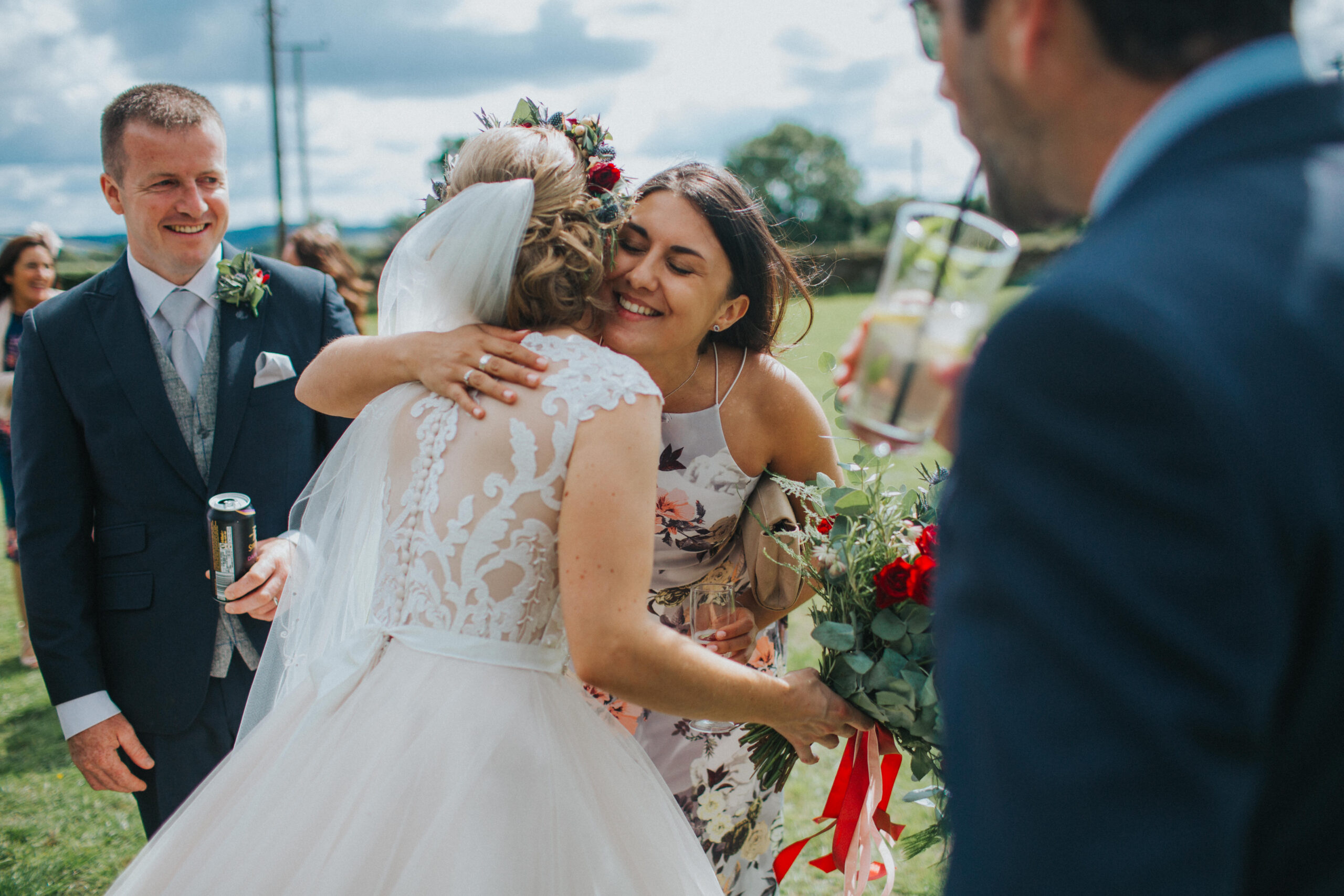 guest embracing bride