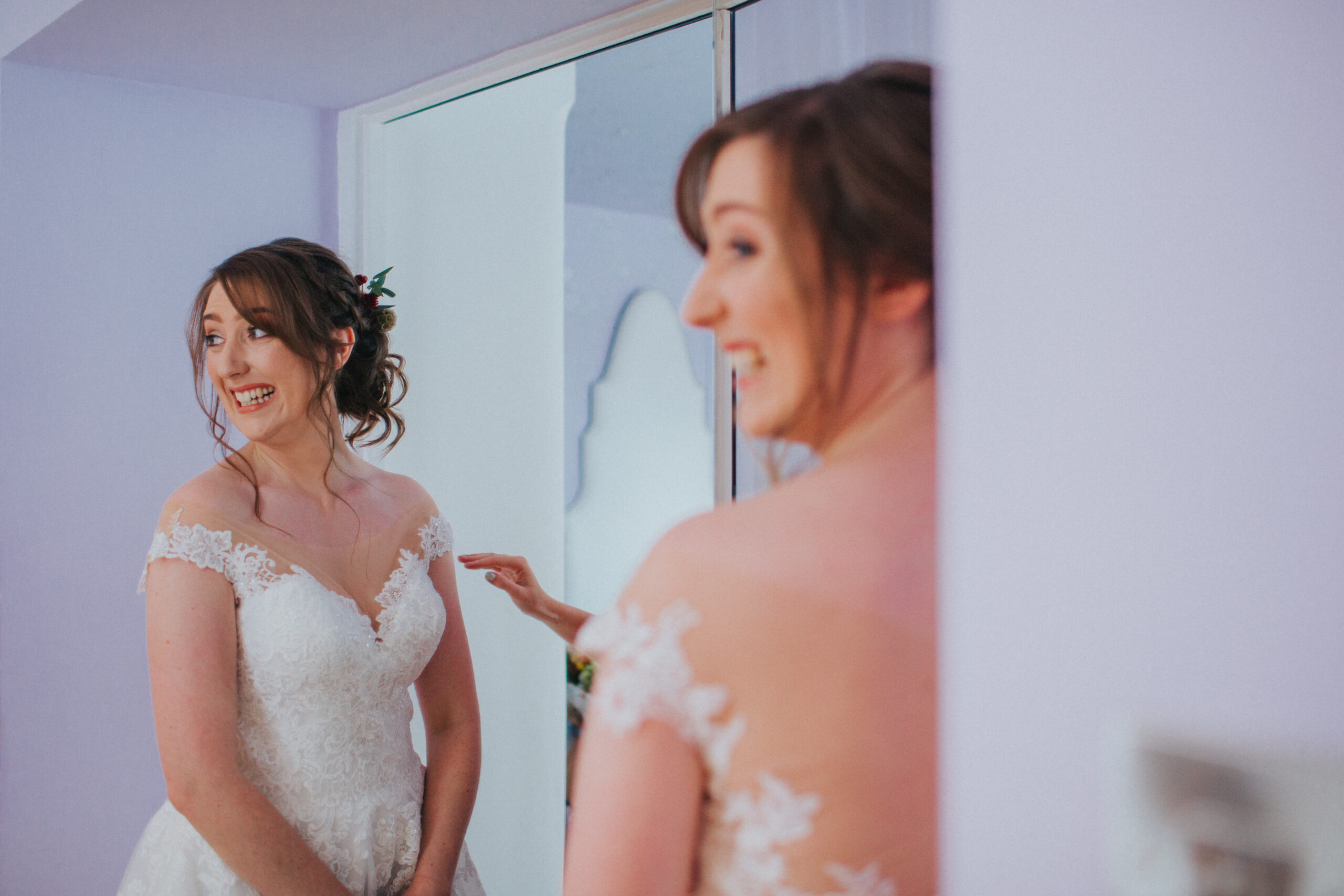bride smiling over her shoulder