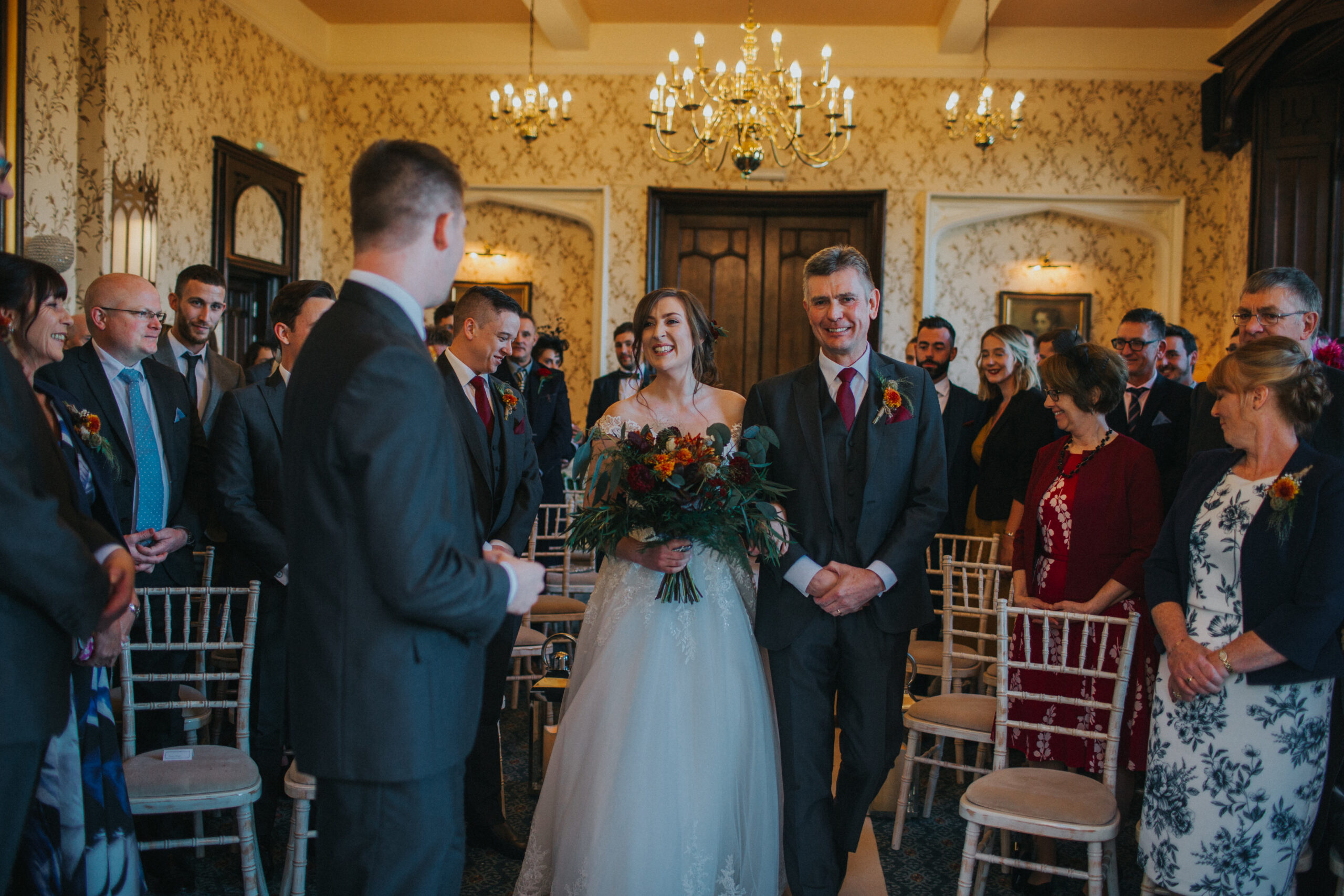 bride walking up aisle with dad at Rowton Castle