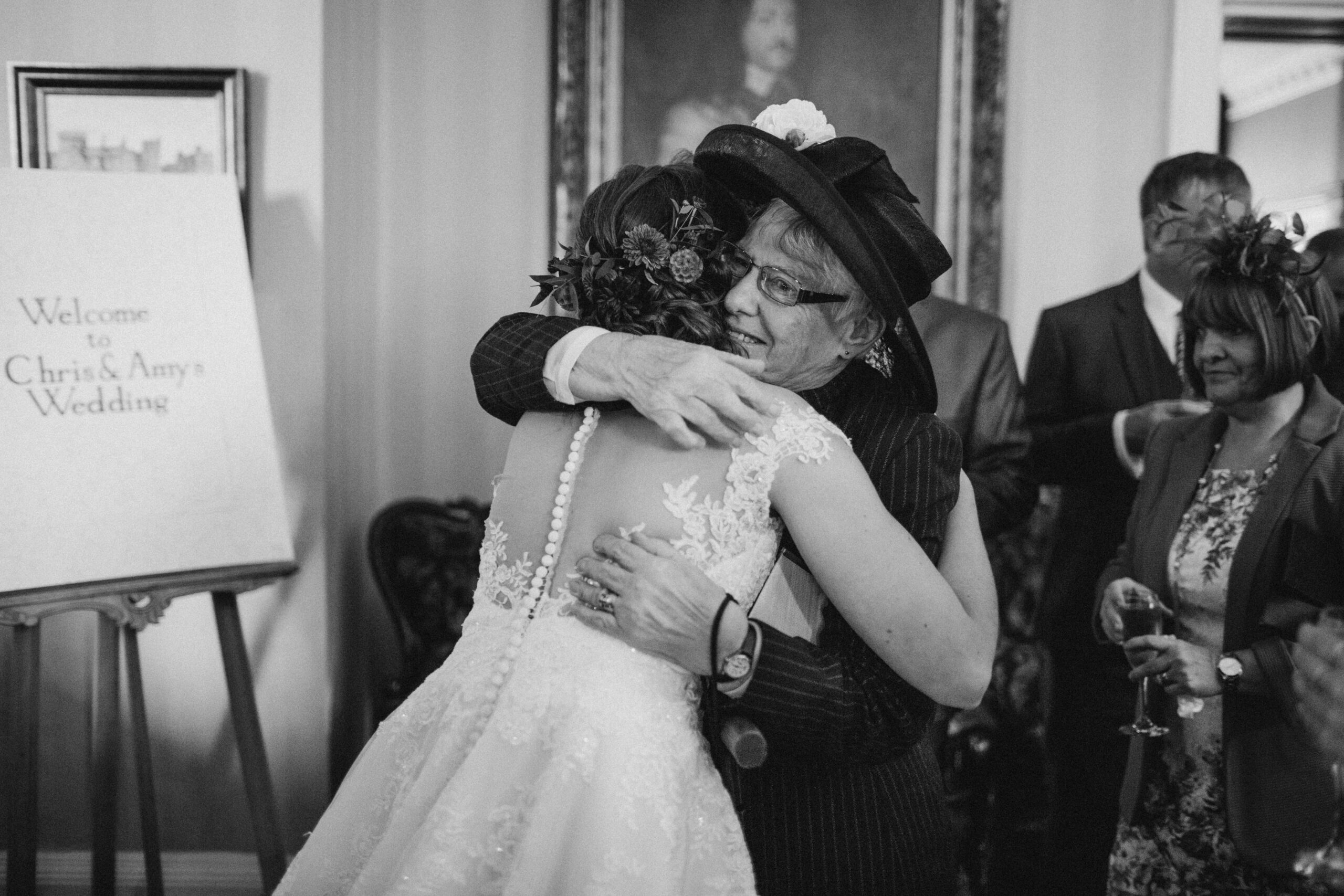 bride's nan embracing bride after wedding ceremony