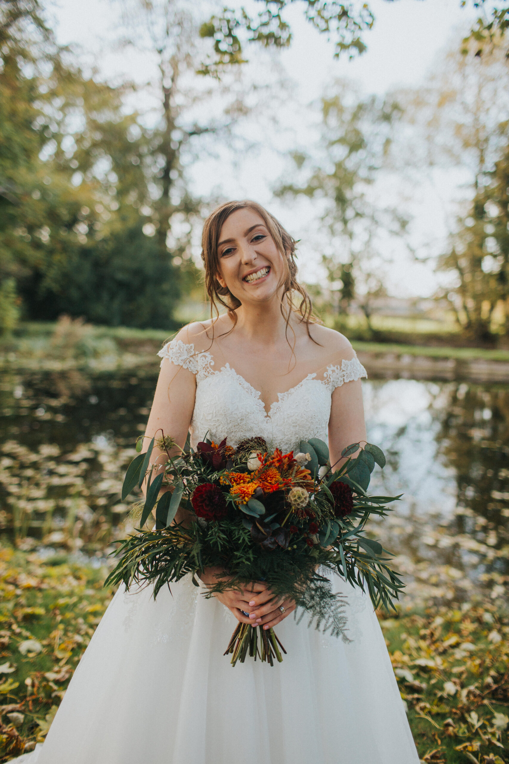 bride smiling in the autumn light