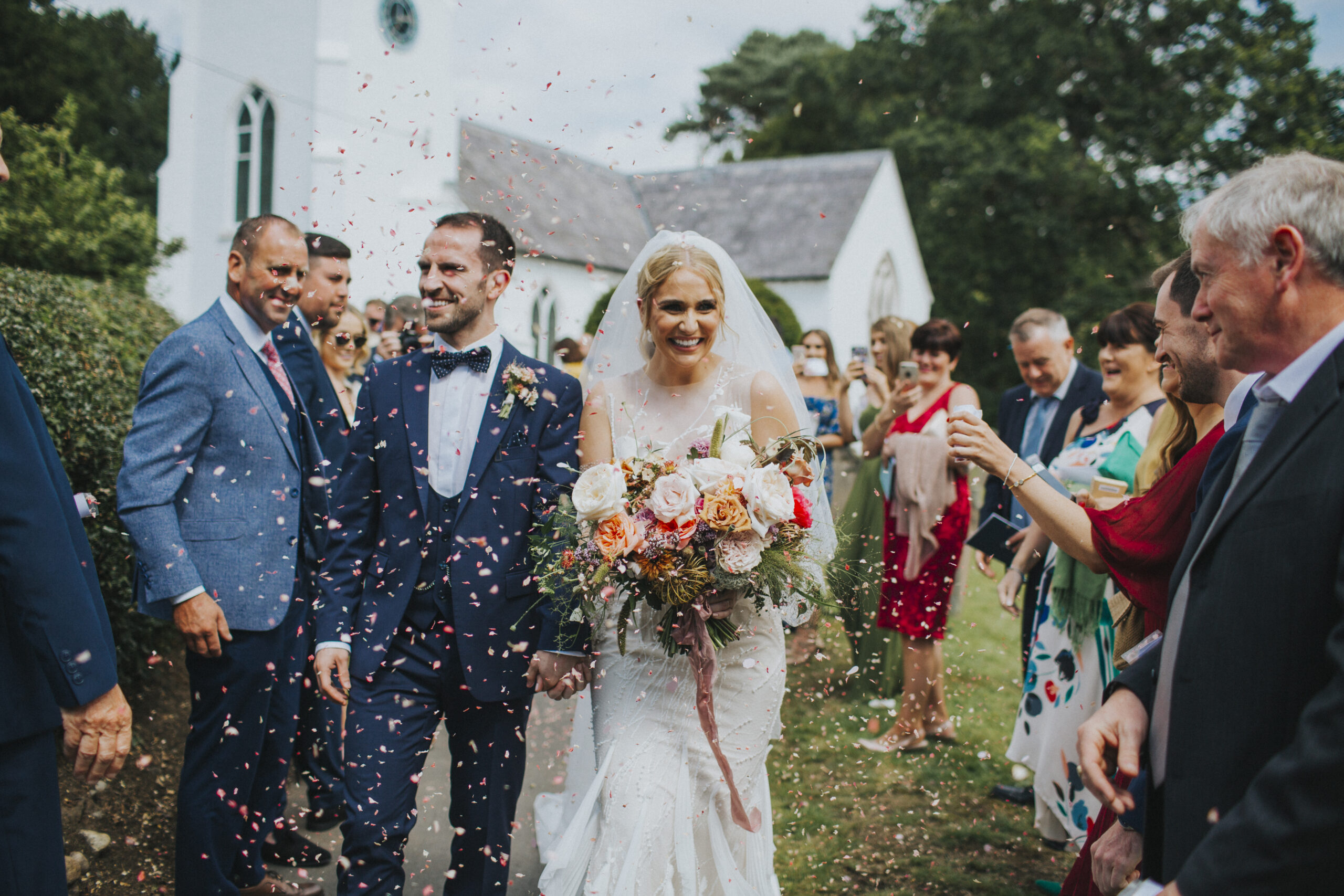 Creative confetti toss captured from a unique angle