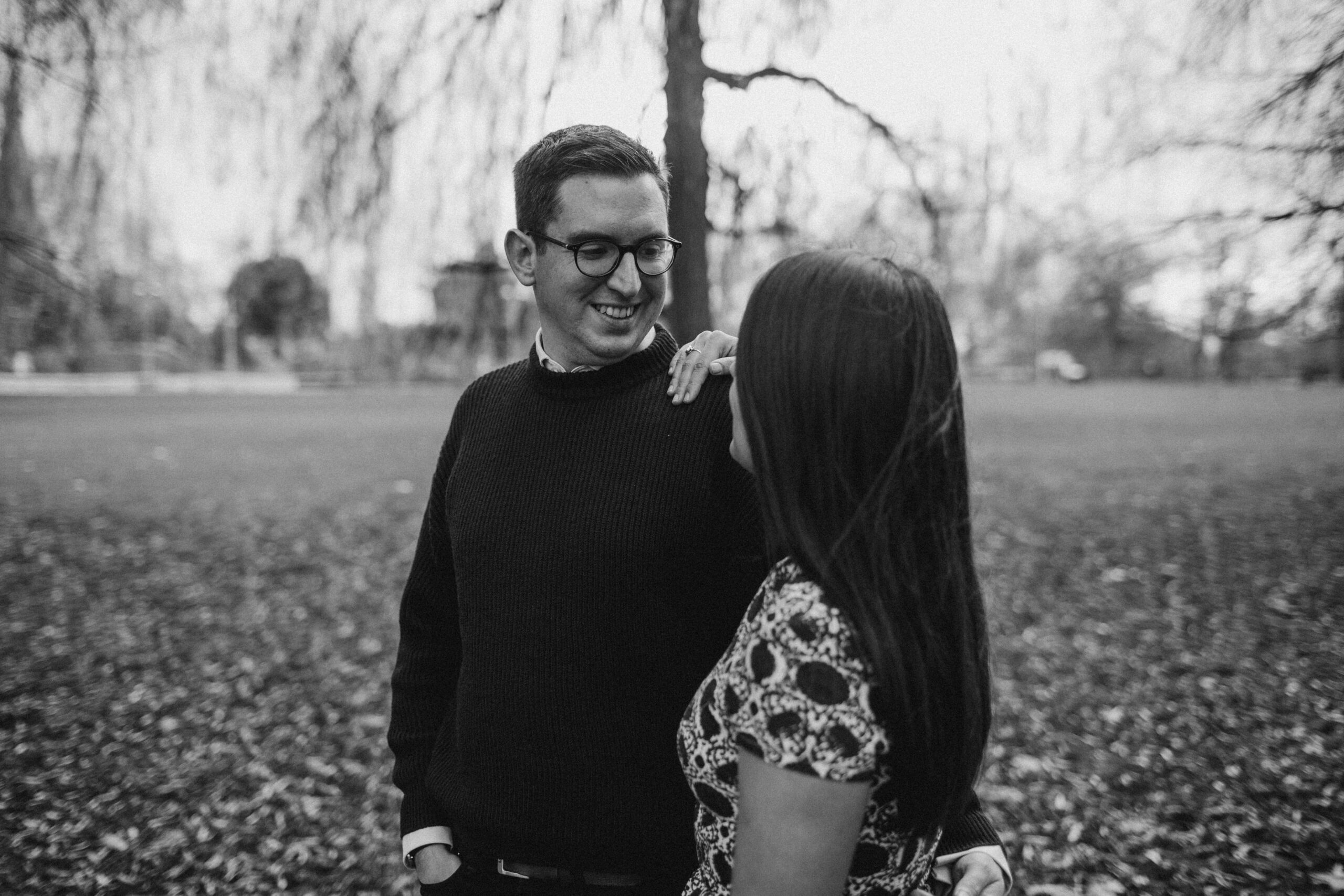 Playful engagement poses in the heart of London's Clissold Park