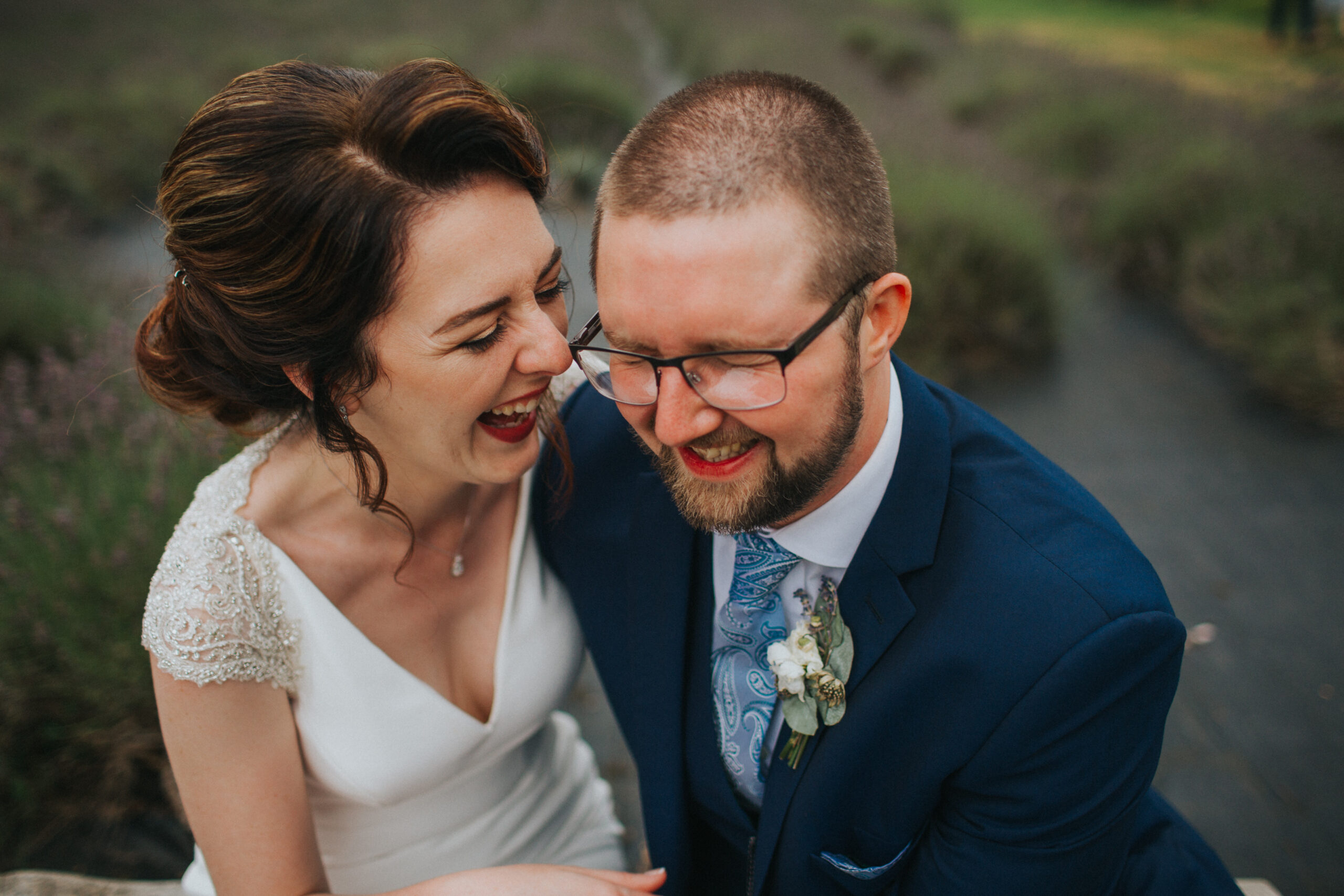 Bride and groom's happiness radiates in the summer glow