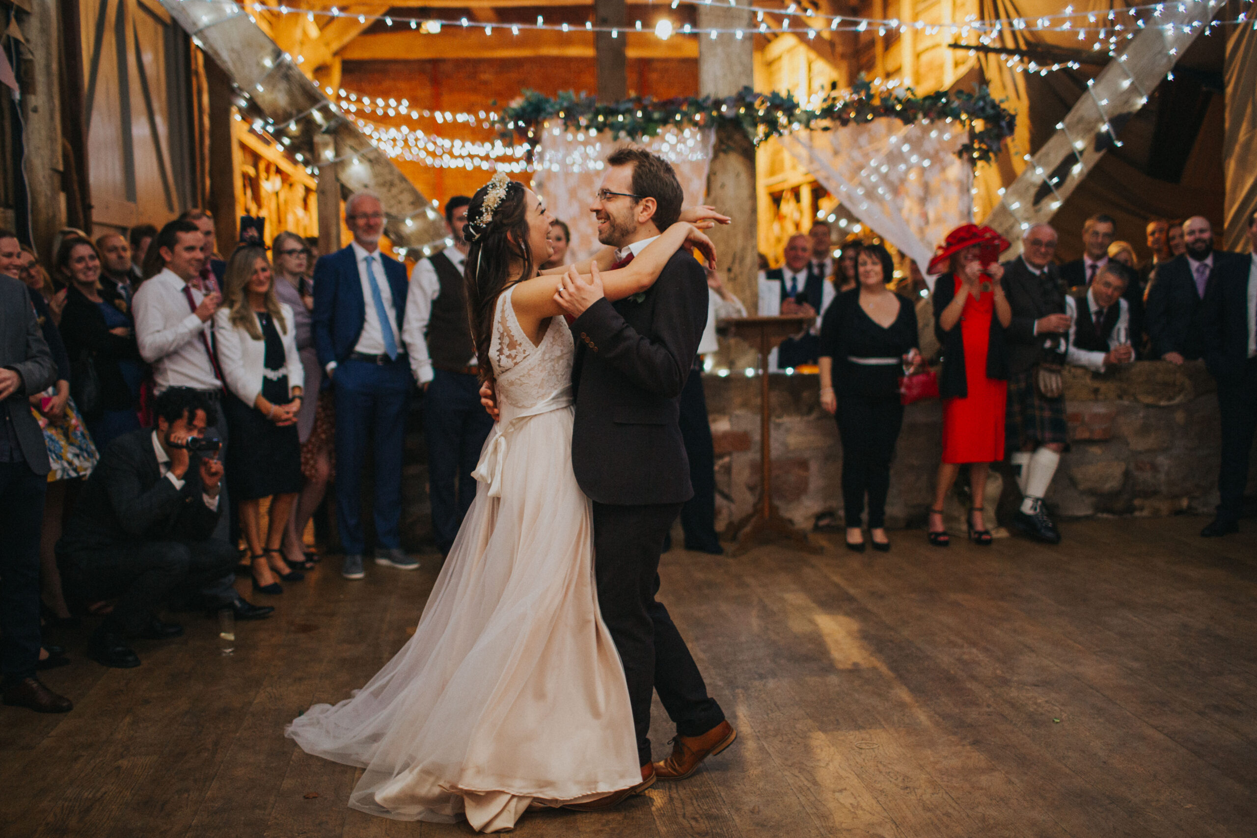 Bride and groom's first dance in the warm tones of fall