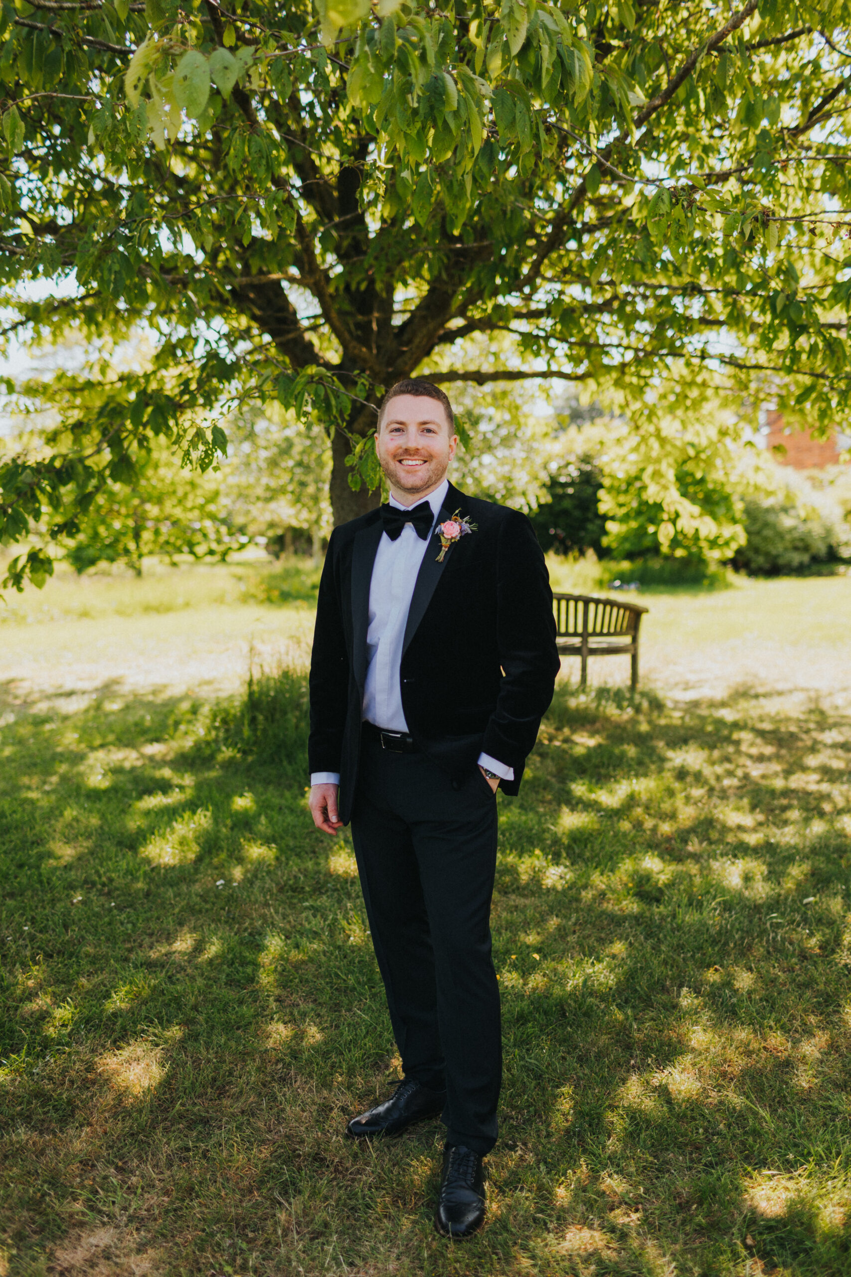 groom in orchard at Hencote Estate
