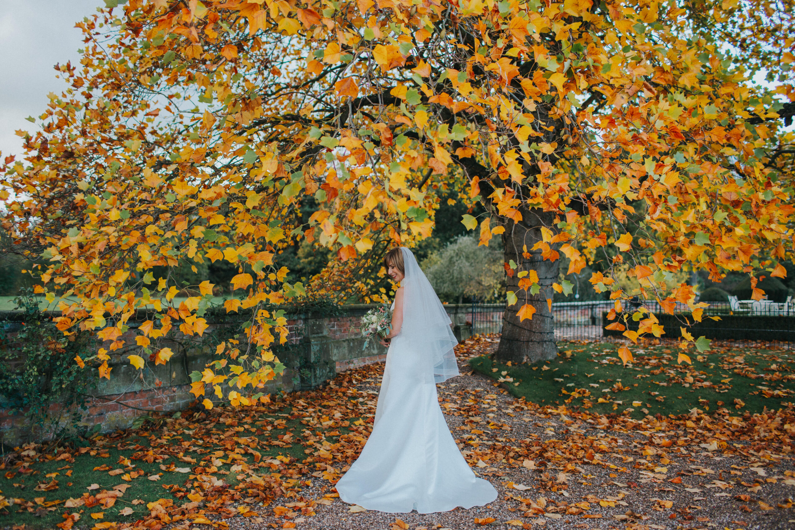 Bridal party enjoys the crisp fall air at Iscoyd Park in Shropshire