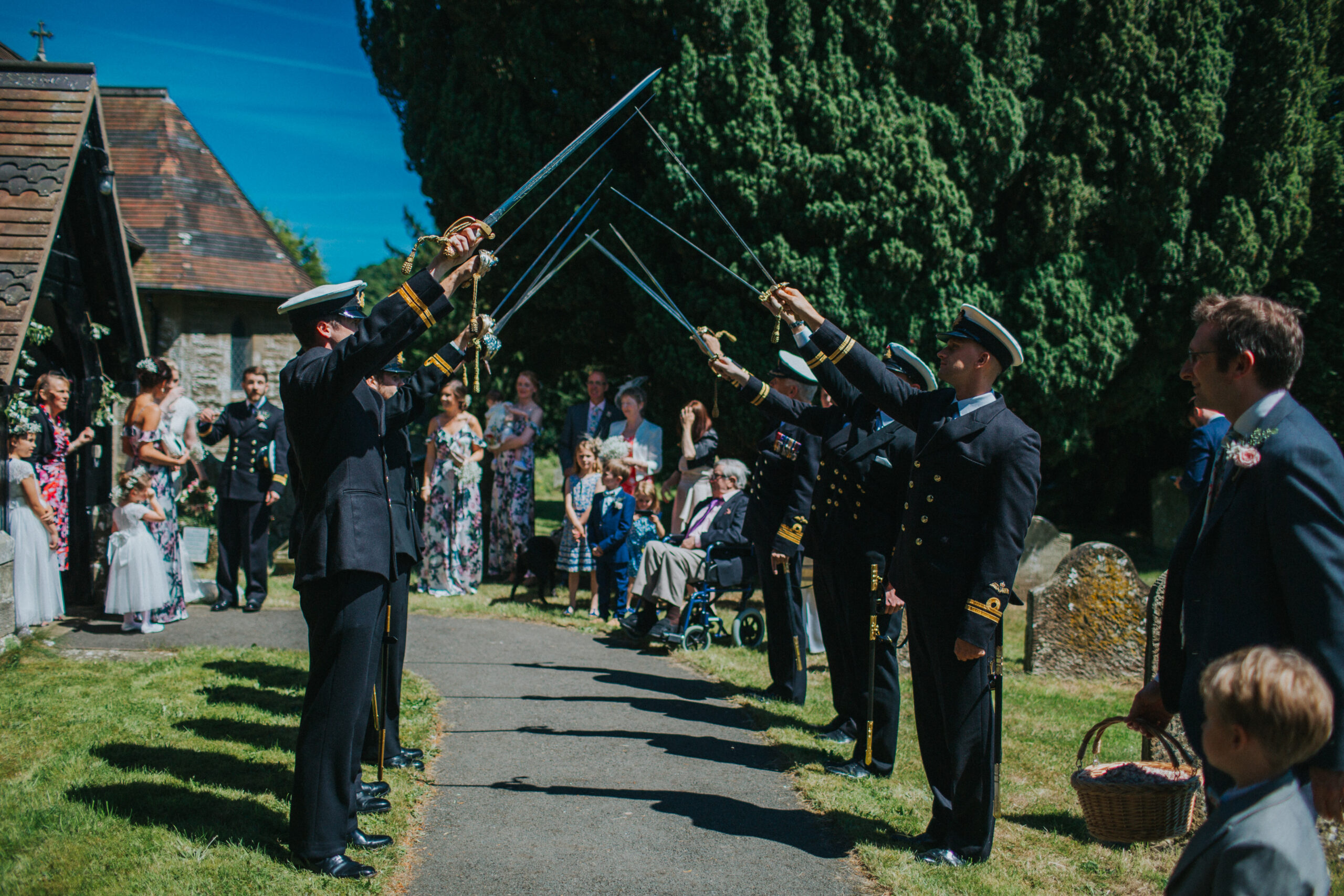 navy sword arch outside church