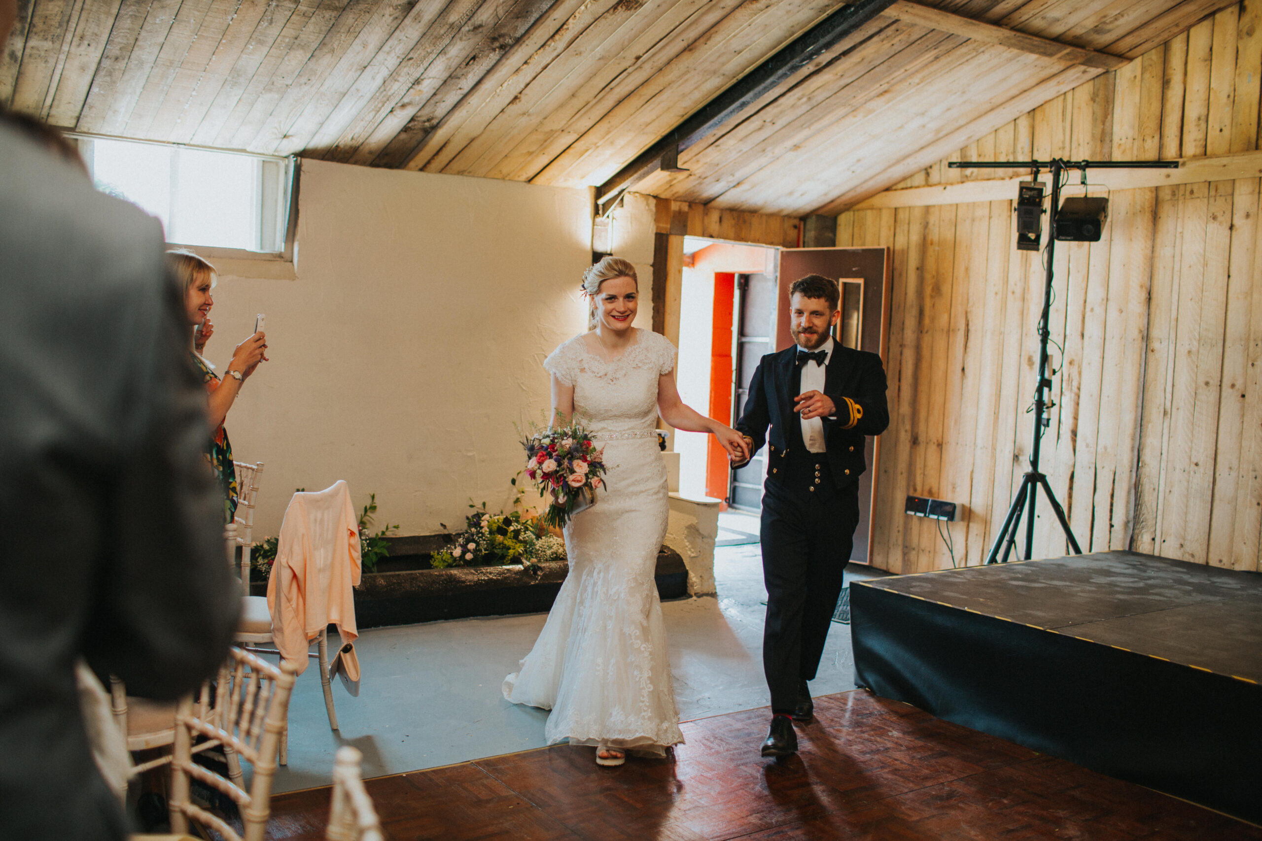 couple entering wedding breakfast