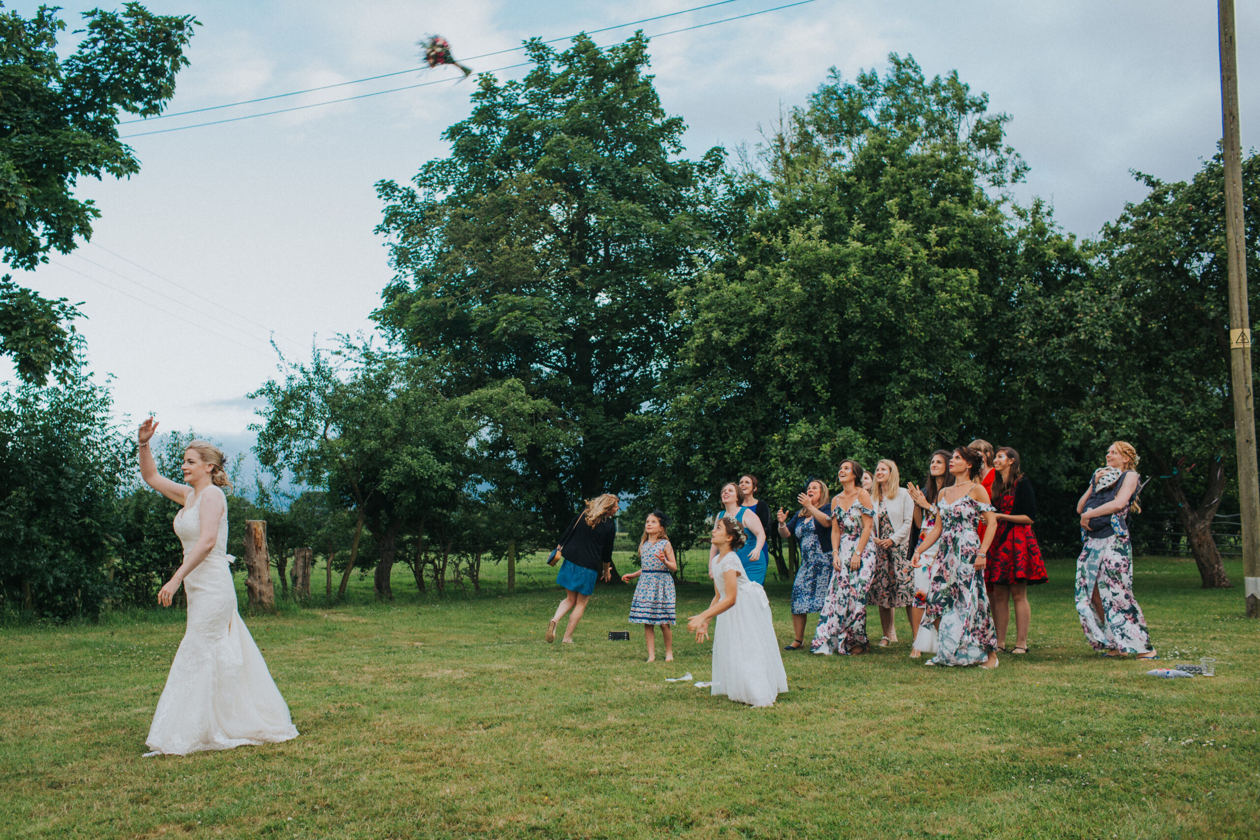 Bride tossing her bouquet