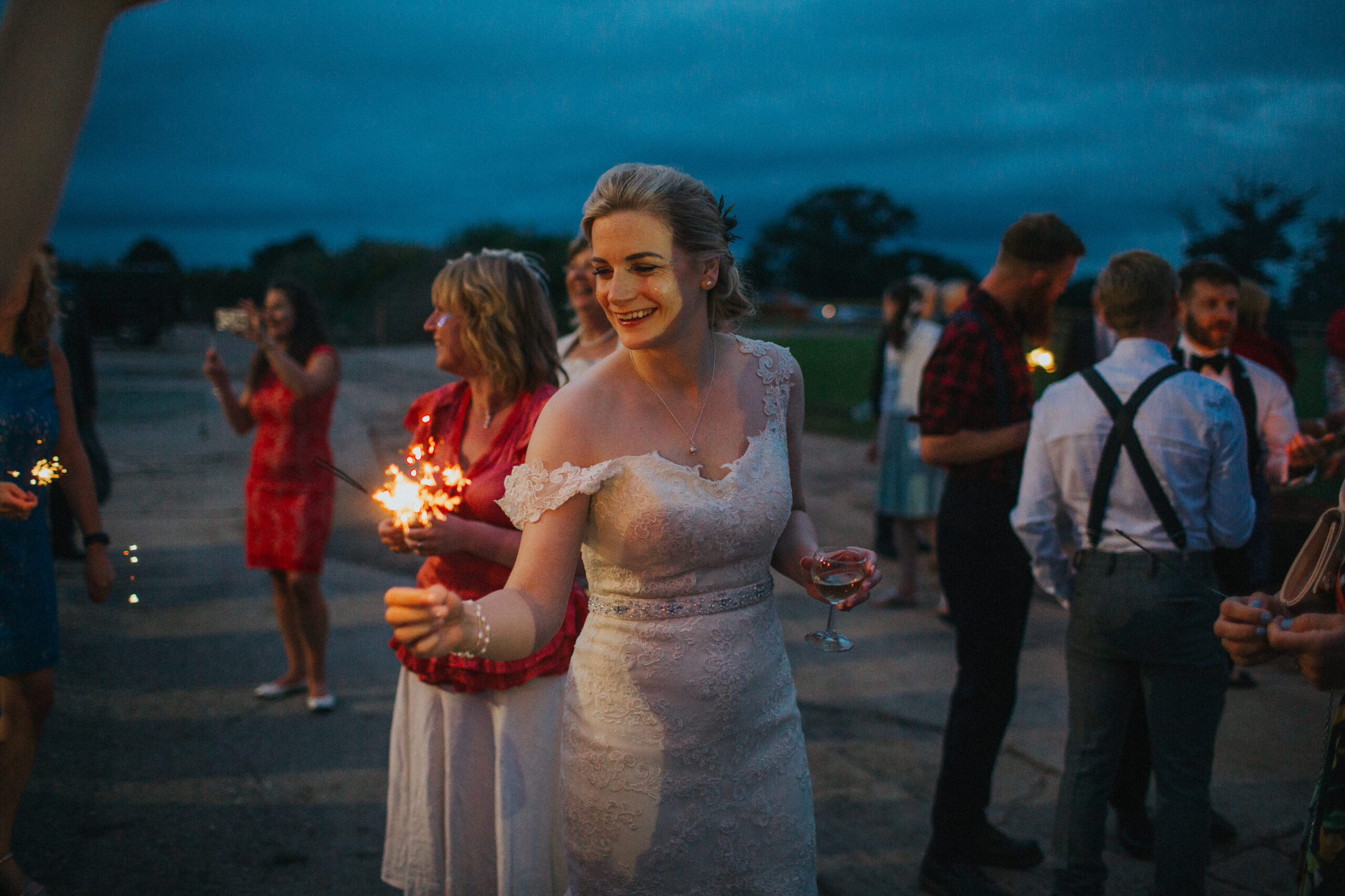 bride holding a sparkler