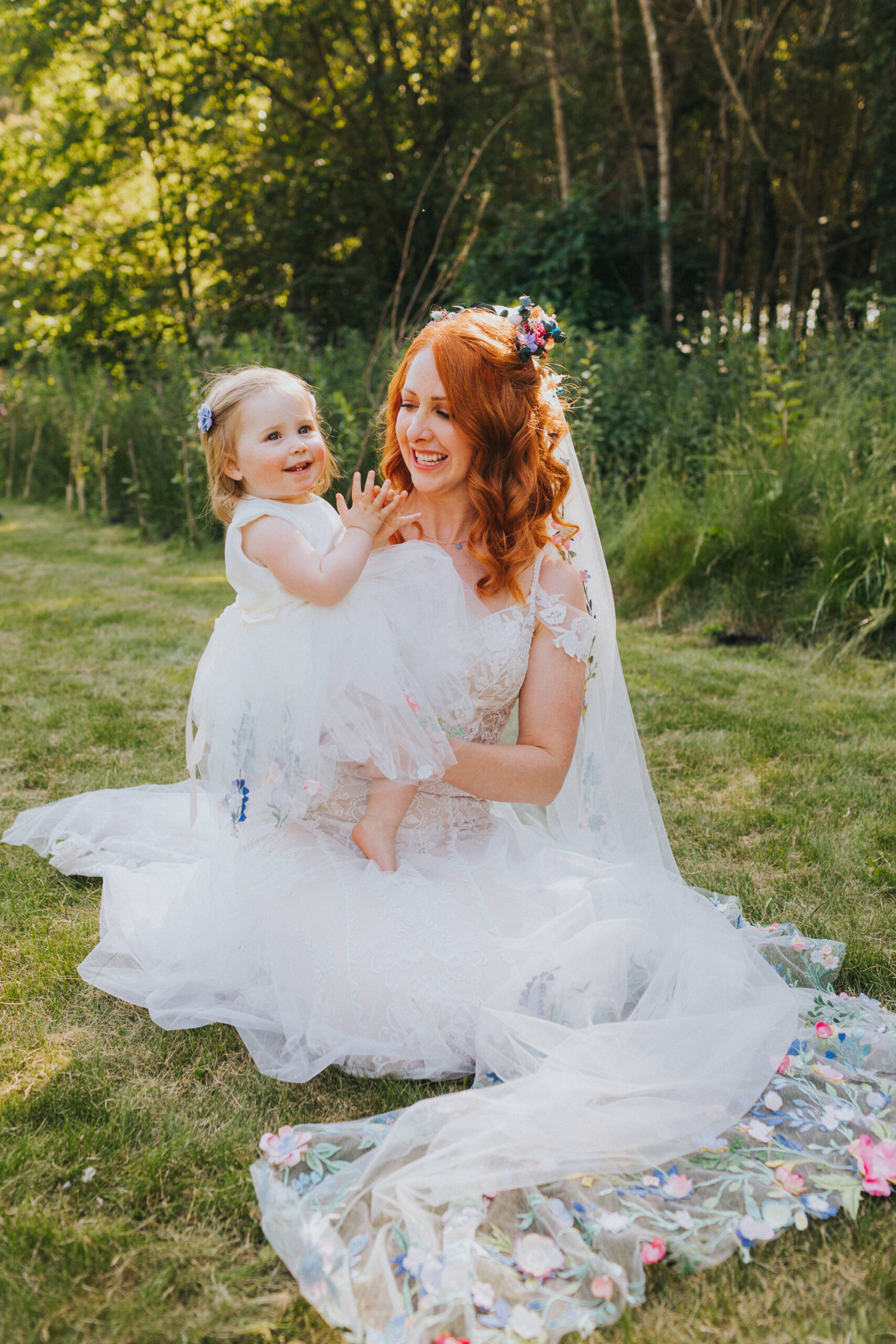 bride with daughter at wedding
