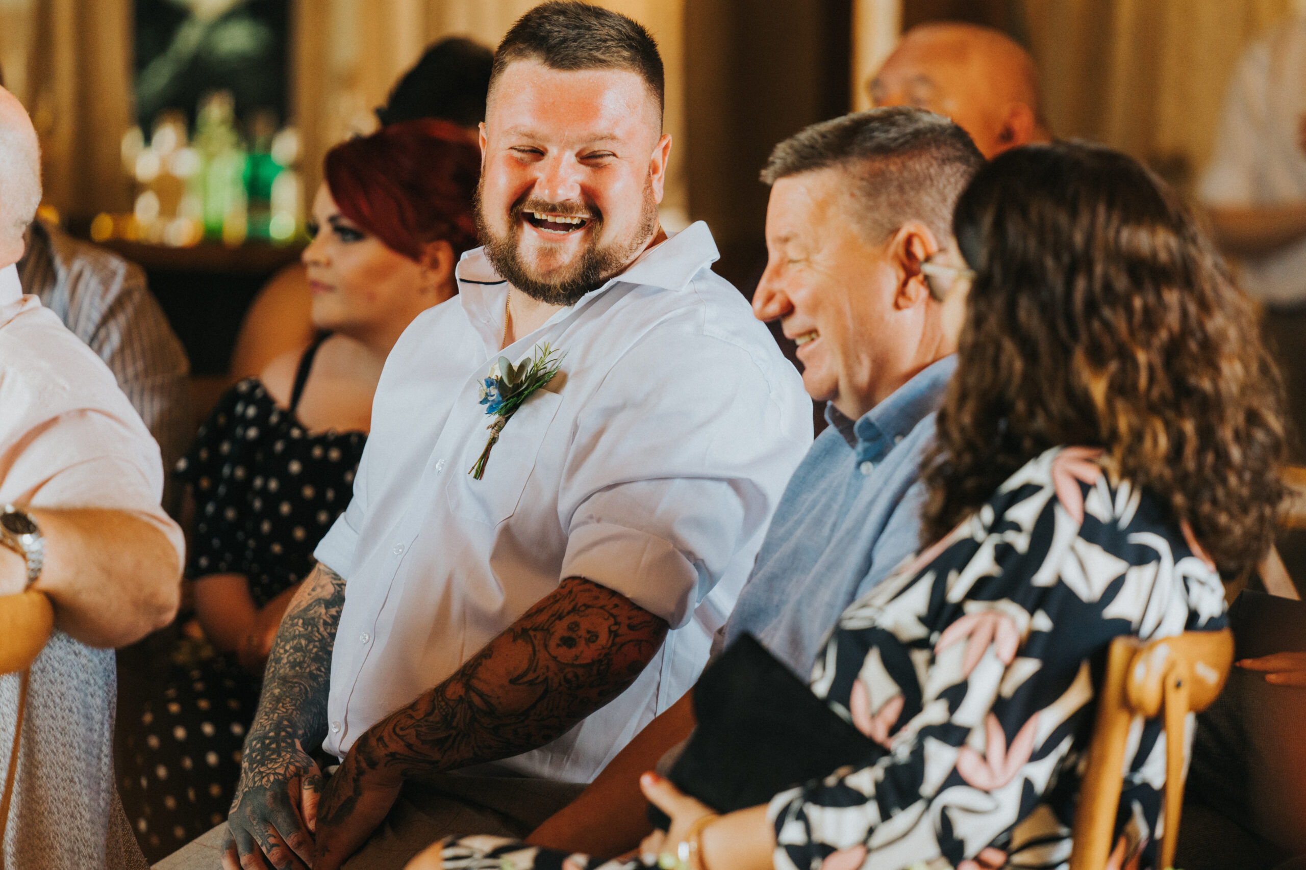 groomsman laughing