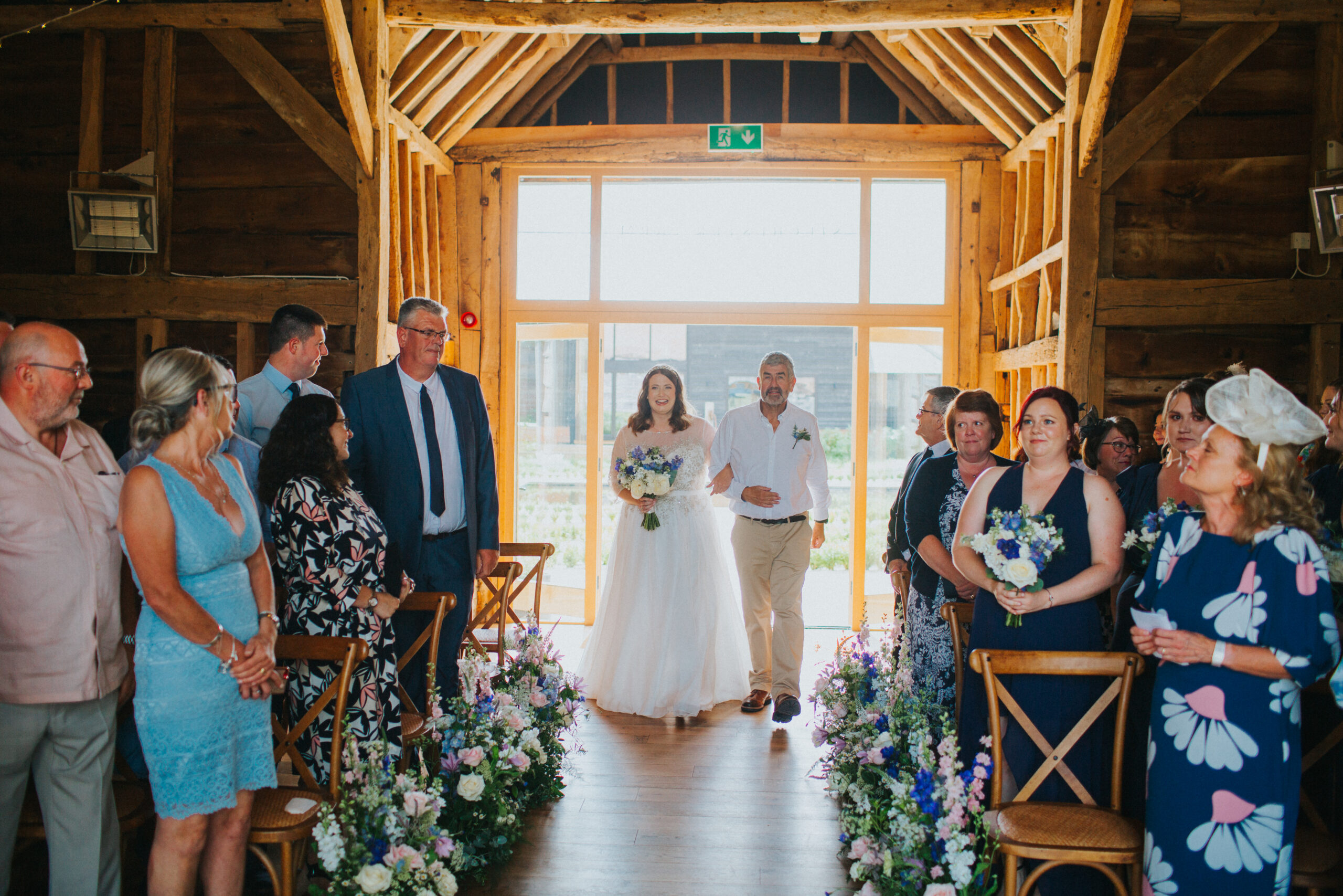 bride walking down aisle at silchester farm