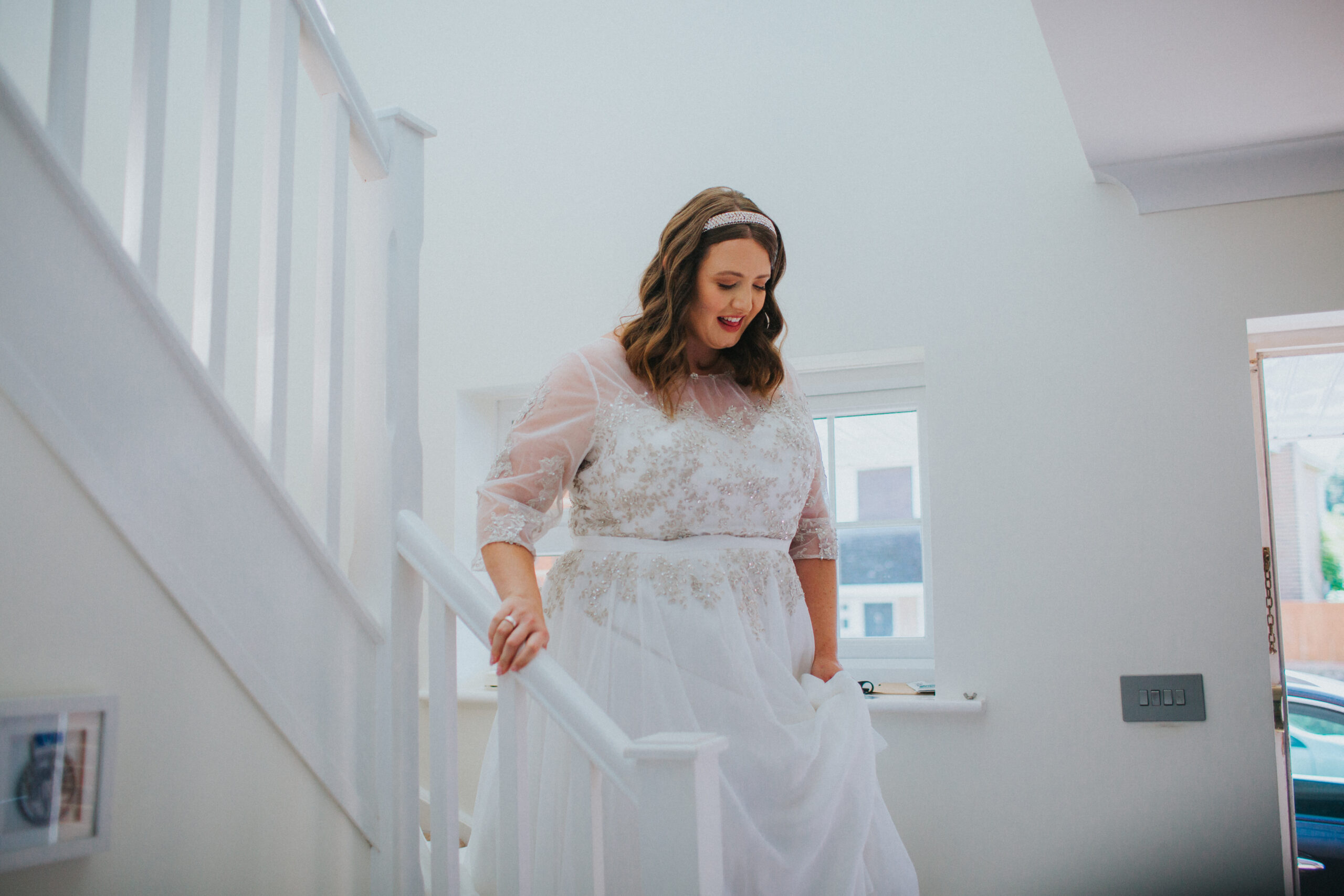 bride descending stairs