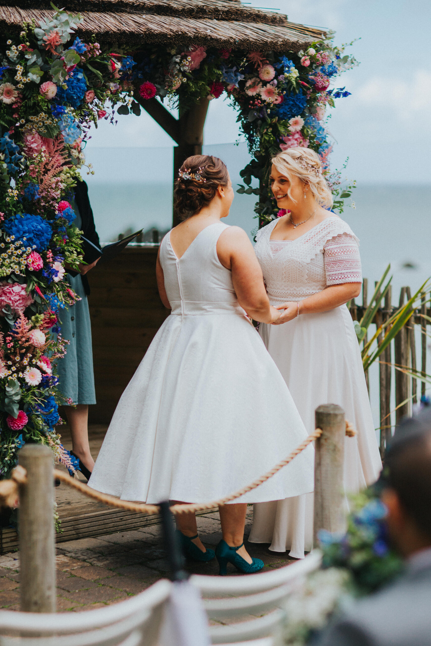 brides holding hands