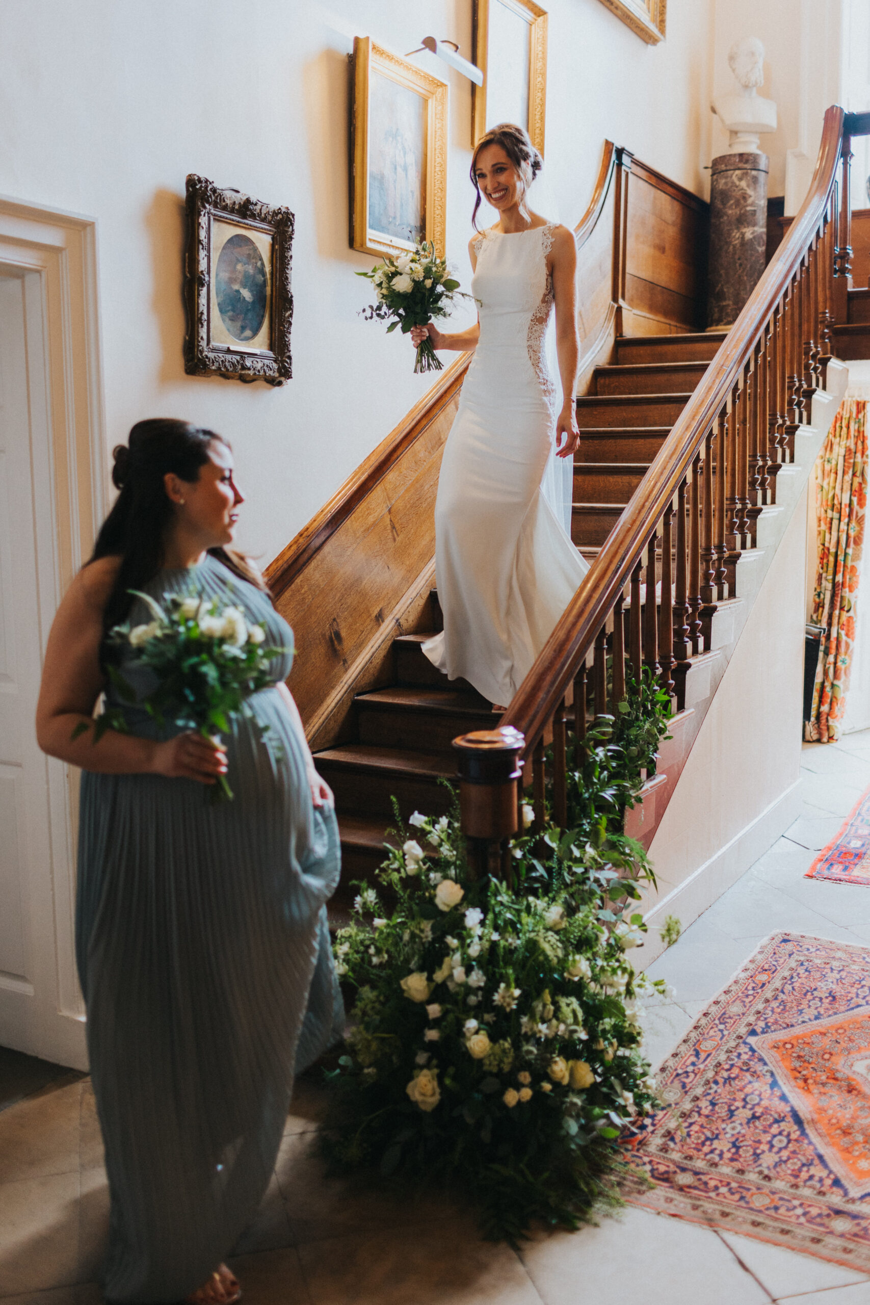 bride coming down the stairs at Iscoyd